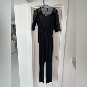BCBG jumpsuit size S, black with lace.